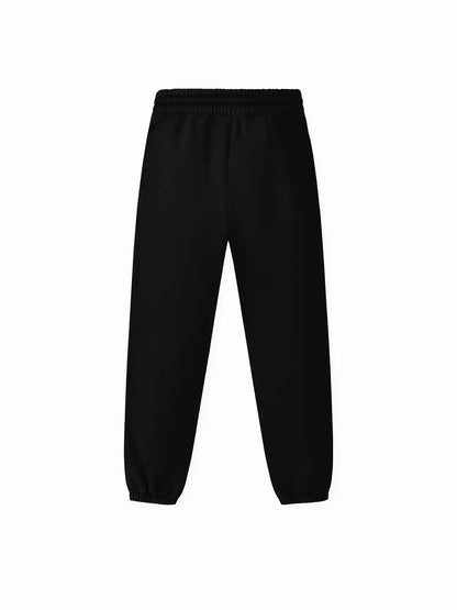 Jogger WE ARE negro oversized, vista posterior